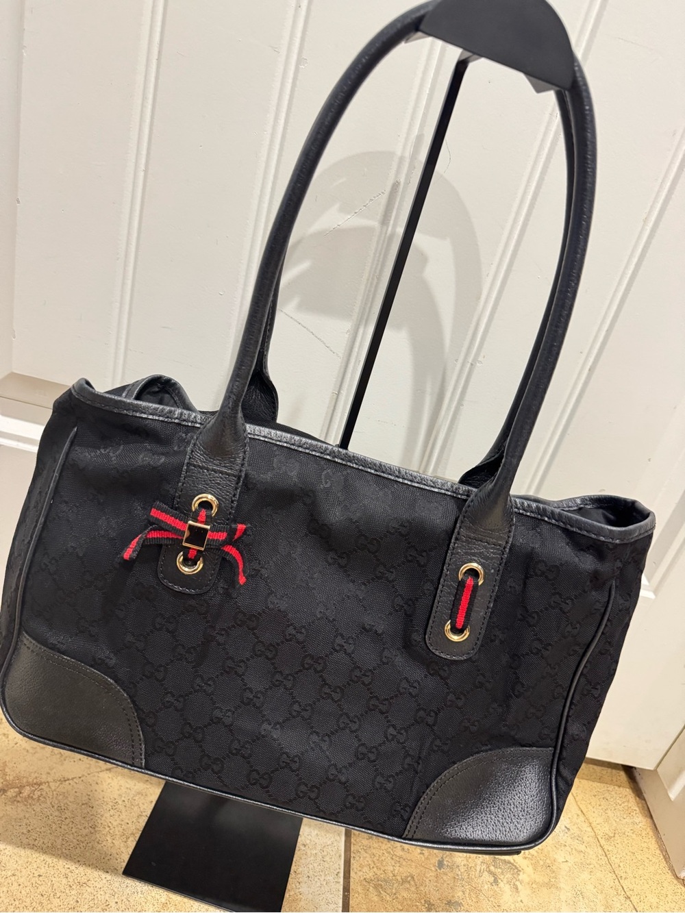 GucciBlack Designer Monogram Tote Bag with Red Accent